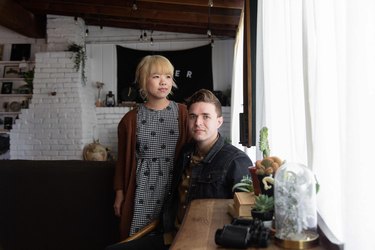 May Xiong and Ben Harthun in their living room.