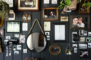 Charcoal wall of objects in living room.