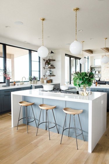 Kitchen island with stove and bar stools