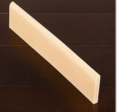 A short length of baseboard material.