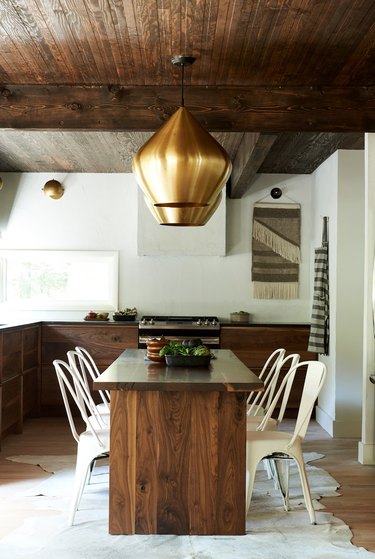 kitchen with natural textures and wood dining table