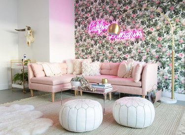 Lauren Bushnell's living room with California Dreaming neon sign