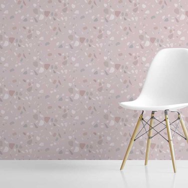 pink terrazzo wallpaper with white chair