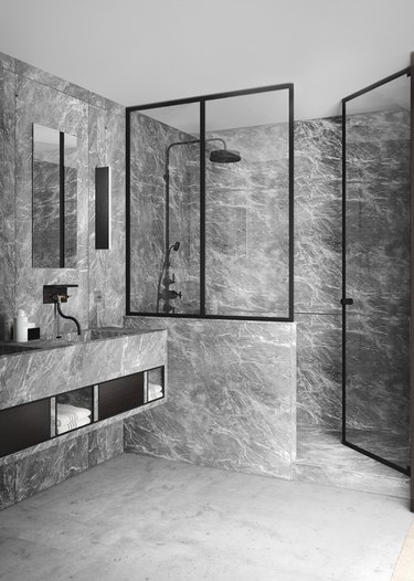 gray and white tile industrial bathroom