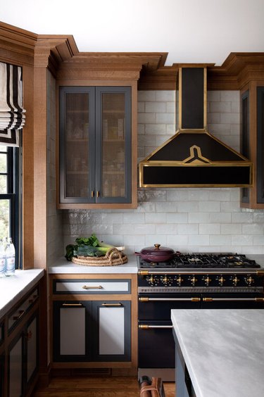 arts and crafts kitchen with white tile backsplash