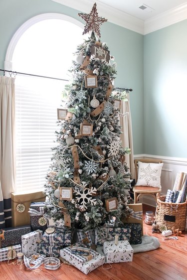 Rustic Christmas tree with DIY wood ornaments and snowflakes