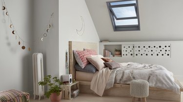 attic storage in bedroom with recessed shelf and moon phase