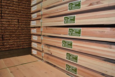 Lumber in a retail store with the FSC logo.