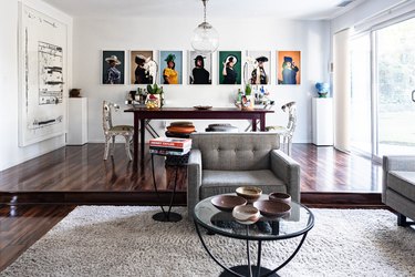 Dining room with art on walls.