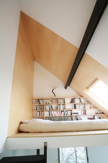 small attic library with bed