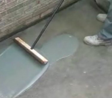 Resurfacing a concrete pad.