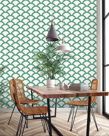 boho coastal dining room with green scallop coastal wallpaper