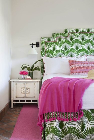 pink and green tropical themed bedroom