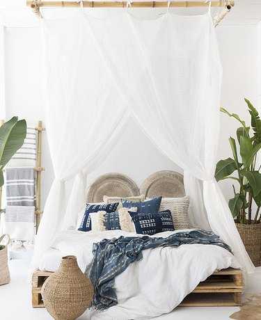 tropical bedroom with white canopy