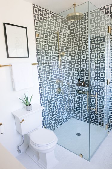 bathroom remodel with patterned wall tile in walk-in shower