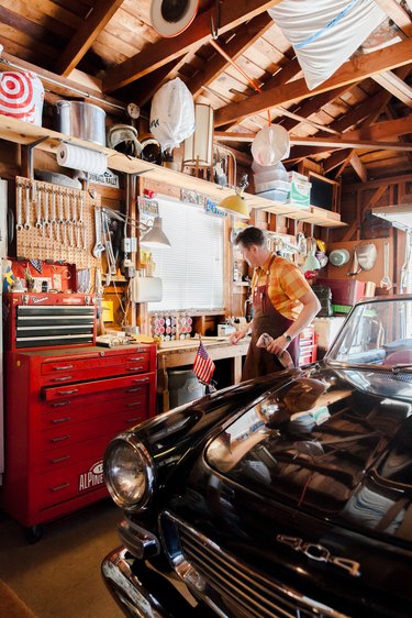 Alex at work in the garage, the opposite side of house from master bedroom.