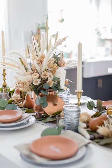 Textured fall centerpiece with pampas grass in copper vase