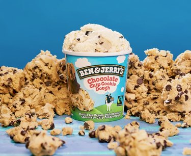 pint of ben & jerry's chocolate chip cookie dough ice cream surrounded by cookie dough