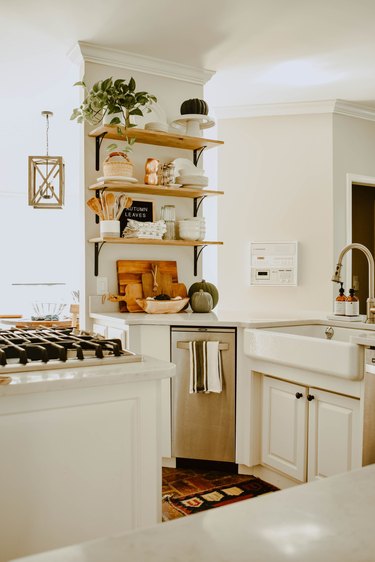 fall kitchen decor in white kitchen with open shelving