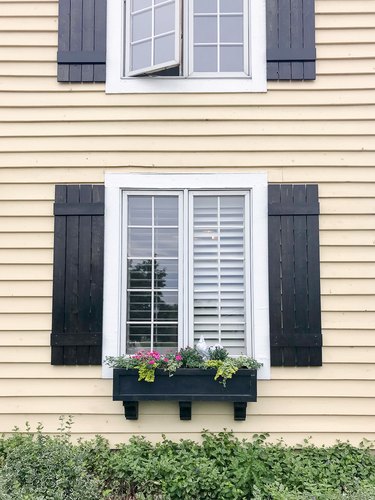 Black board and batten exterior shutter style on traditional Craftsman home