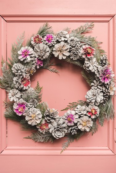 DIY spray painted pinecone Christmas wreath by The House That Lars Built