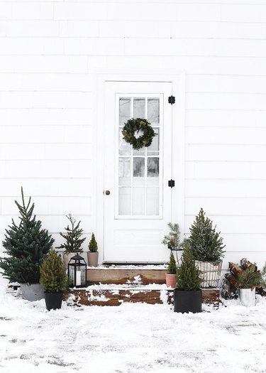 Outdoor Christmas wreath on patio by The Merrythought