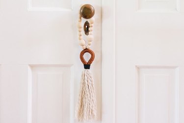 Bohemian door tassel in neutral colors.