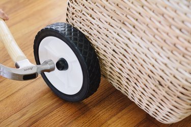 Hammering hubcap onto rod