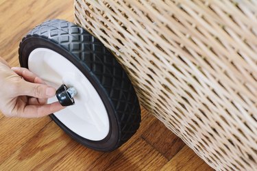 Wheel and hubcap placed on rod