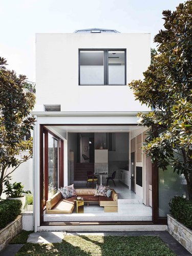 white home exterior with glass doors
