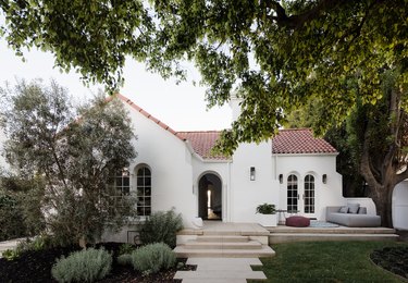 white home exterior with spanish tile roof