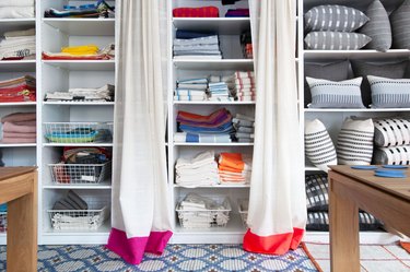 built-in bookcase with textiles and accent pillows