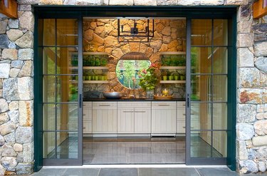 Stone Exterior Homes on Stone pool house kitchenette by Pimlico Interiors