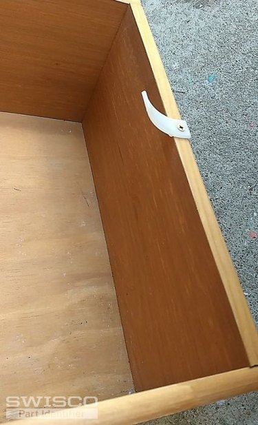 Bendable plastic drawer stops.