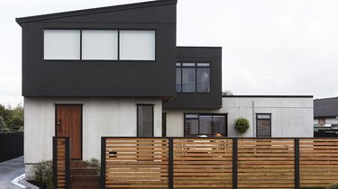 Black and white exterior paneling on modern home
