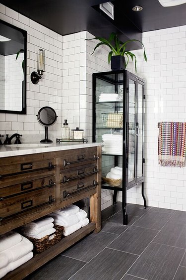 Industrial bathroom with subway tile