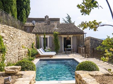 French country exterior with pool