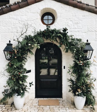 Floral Christmas garland with Christmas yard decorations