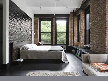 industrial bedroom with brick walls