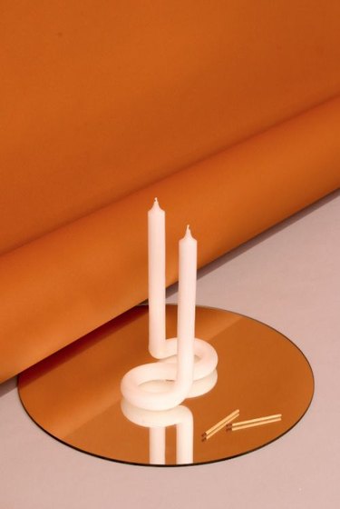 Trending Fall Decor with abstract candle on mirror