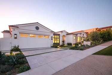 Exterior Garage Lighting on classic exterior with wide garage and industrial lighting