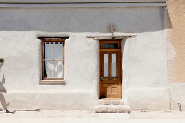 The front door of the adobe rowhouse.