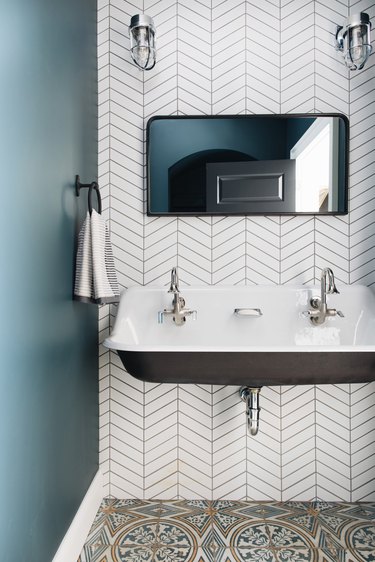 small bathroom with chevron tile