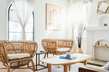 white room ideas with rattan chairs and white curtains