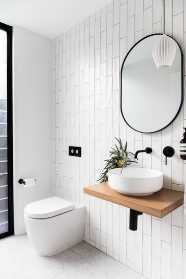 pendant lighting bathroom idea for white bathroom with black mirror and white pendant