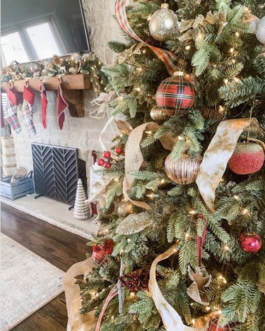 Multiple Christmas tree ribbons on one tree