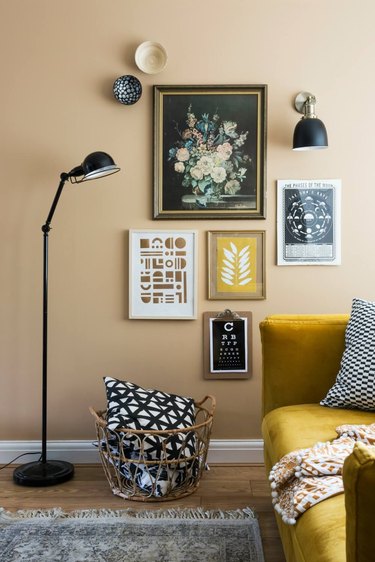 yellow living room with yellow gallery wall