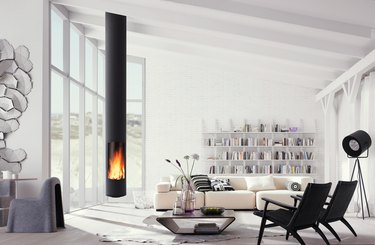 cylindrical hanging fireplace in modern living room