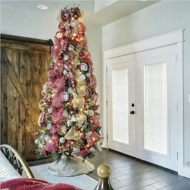 Deco mesh Christmas tree decor in red and gold. Simple and elegant