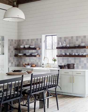 blue pattern tile backsplash in kitchen mint green cabinets and shiplap walls